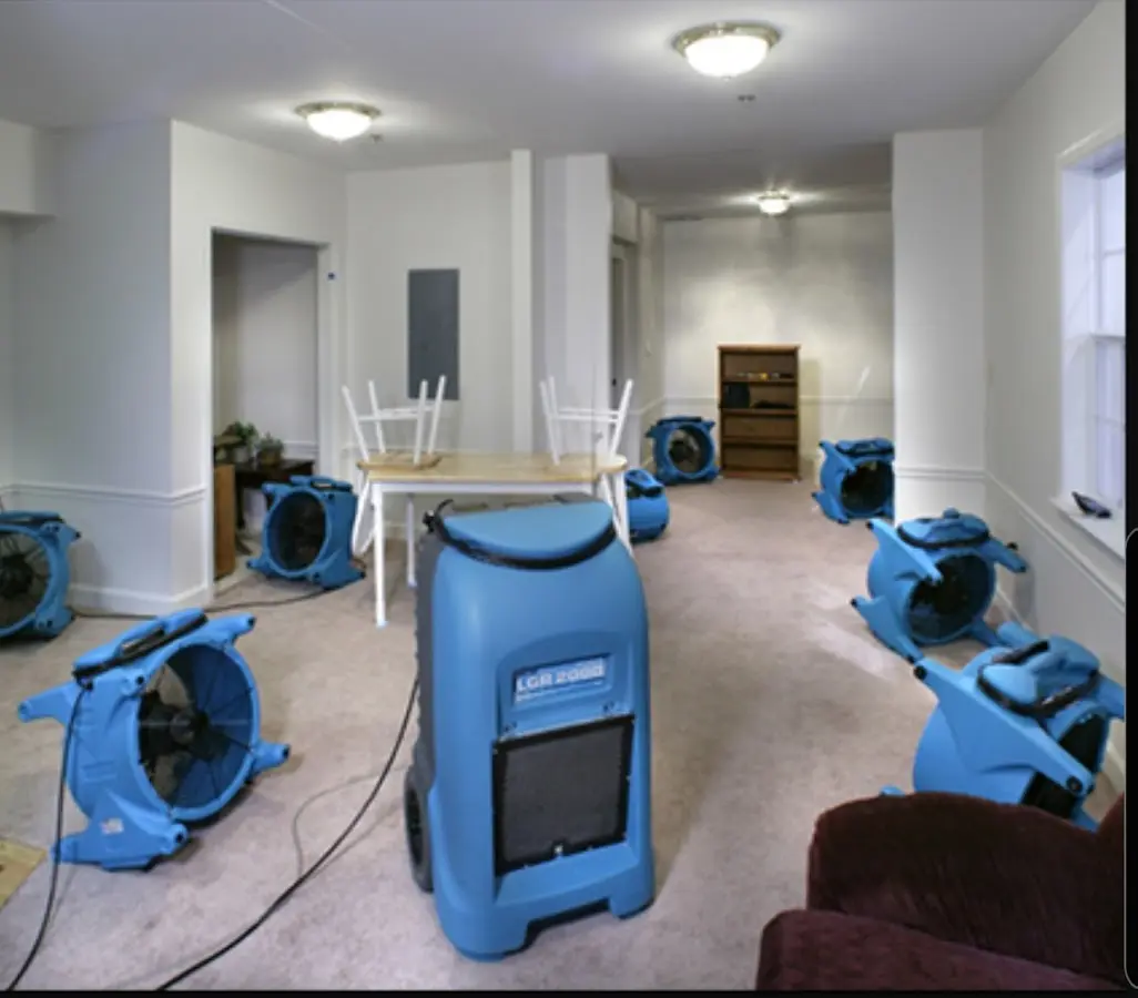 Air movers and dehumidifier setup for Water Damage Restoration in Herrin